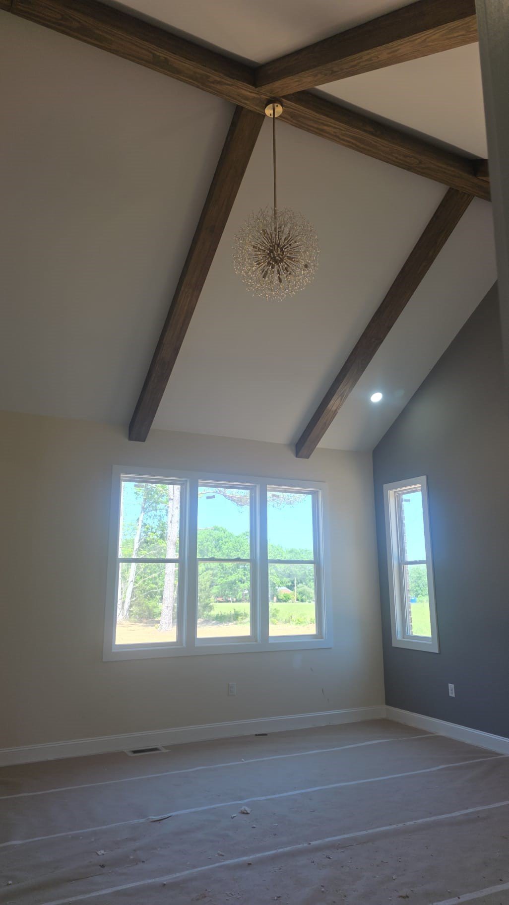 Arias Painting NC LLC team working on a residential painting project